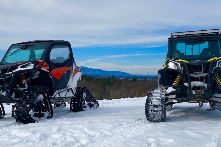 a pile of snow next to a car